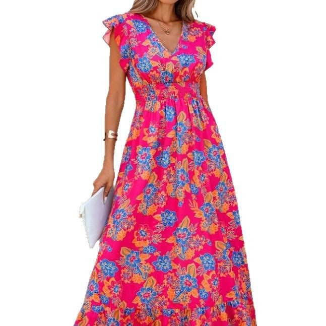 Damer maxiklänning med flödande tyg och blommiga mönster Eva Jonsson-Eva Jonsson