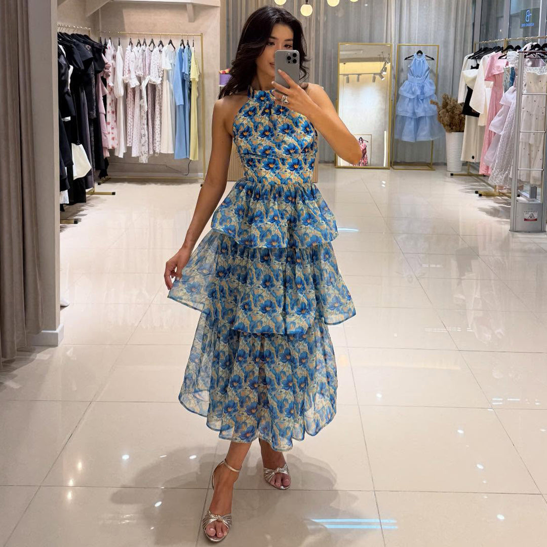 Damer maxiklänning med transparenta lager och blommönster Mirla-Eva Jonsson