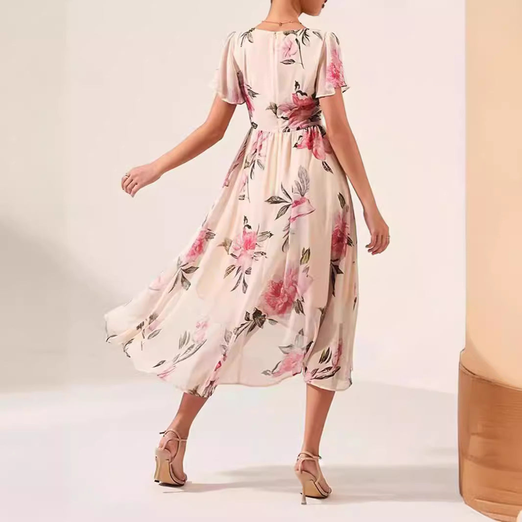Damer maxiklänning med voluminös kjol och blommönster Mirla-Eva Jonsson