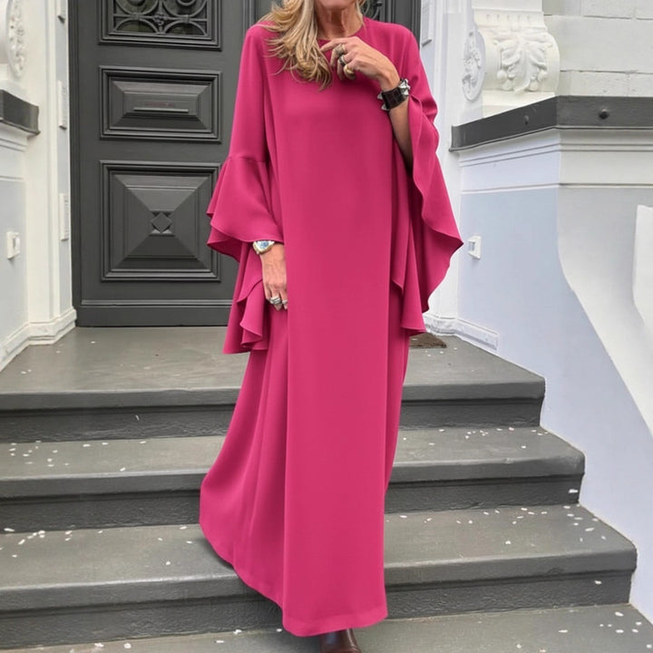 Damer maxiklänning med voluminösa ärmar Mirla-Eva Jonsson