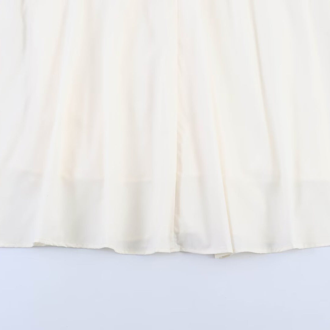 Damer midi-klänning med elegant skärning och flödande kjol Mirla-Eva Jonsson
