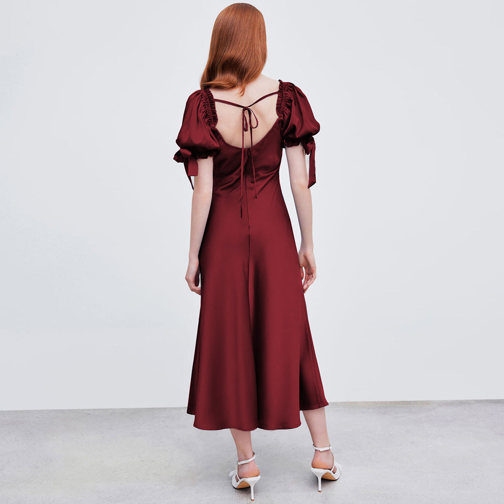 Damer midi-klänning med eleganta puffärmar och stiligt V-ringat Mirla-Eva Jonsson