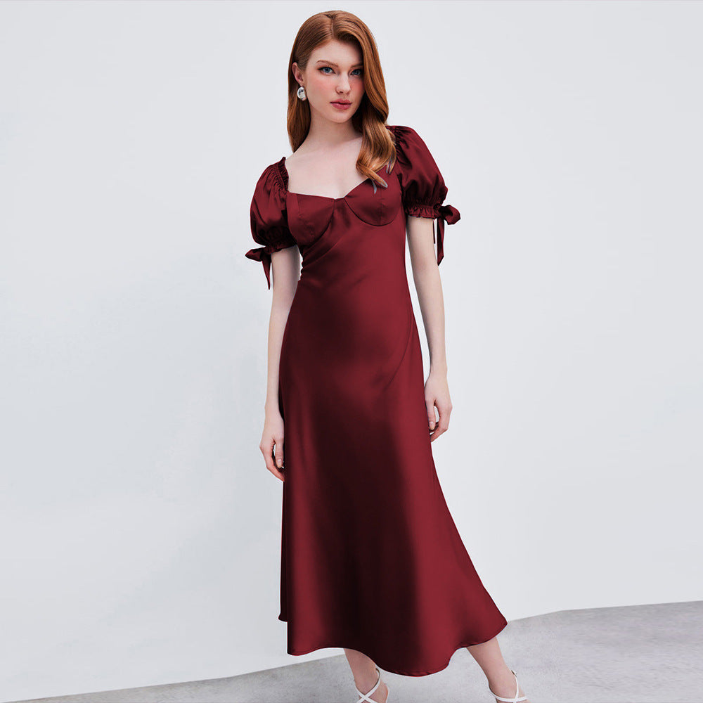 Damer midi-klänning med eleganta puffärmar och stiligt V-ringat Mirla-Eva Jonsson