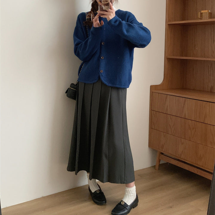 Damer mjuk cardigan med elegant knappslå och modern passform Mirla-Eva Jonsson