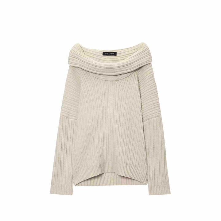 Damer mjukt stickat plagg med asymmetrisk halsringning och ribbad design Mirla-Eva Jonsson