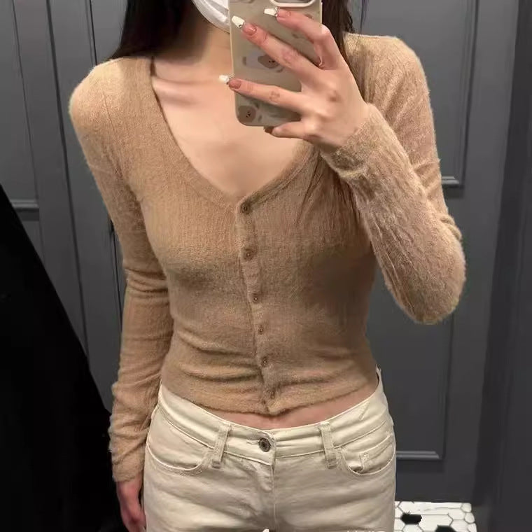 Damer mode cardigan med V-hals och knappstängning Mirla-Eva Jonsson