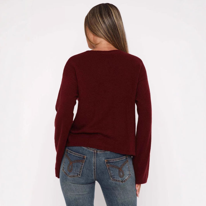 Damer mode cardigan med innovativ snörning design och oversized ärmar Mirla-Eva Jonsson