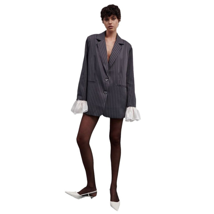 Damer mode oversized blazerjacka med eleganta volangdetaljer Mirla-Eva Jonsson