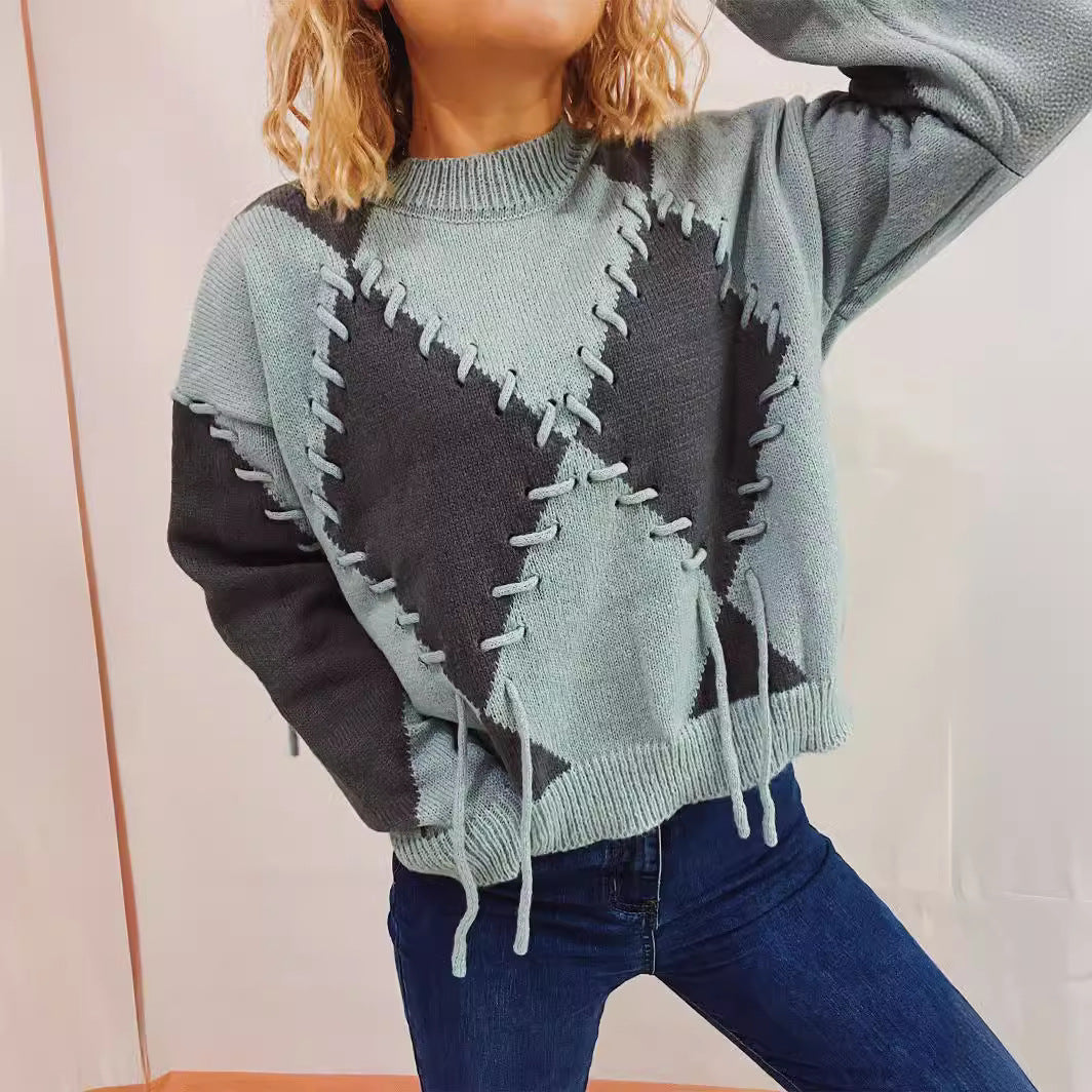 Damer mode oversized tröja med korsade dekorativa sömmar Mirla-Eva Jonsson
