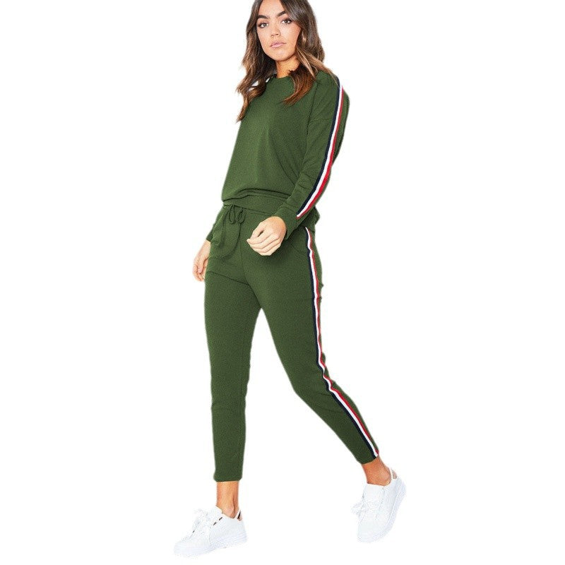 Damer mode sportset med kontrasterande sidostråk och elastisk midja Mirla-Eva Jonsson