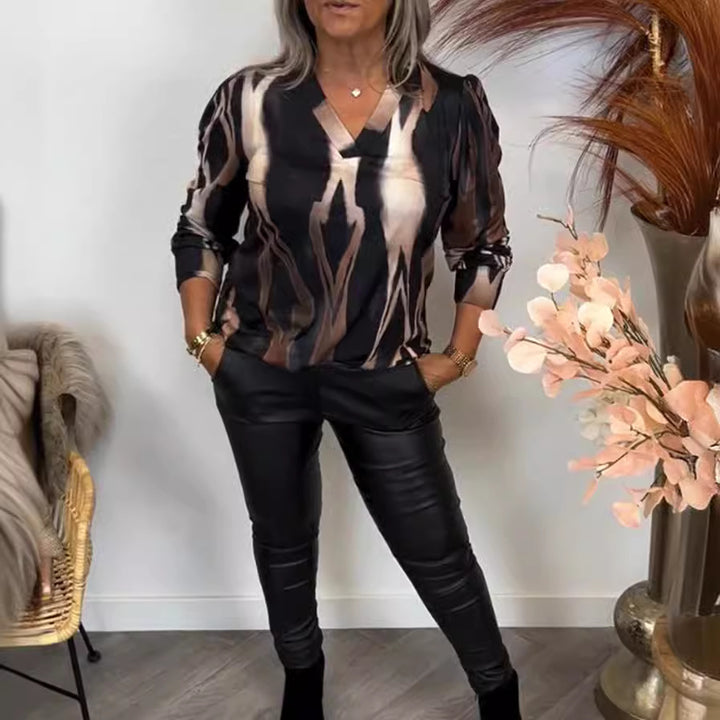 Damer mode topp med V-hals och unika mönster Mirla-Eva Jonsson