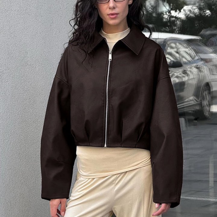 Damer modemedveten cropped läderjacka med voluminösa ärmar Mirla-Eva Jonsson