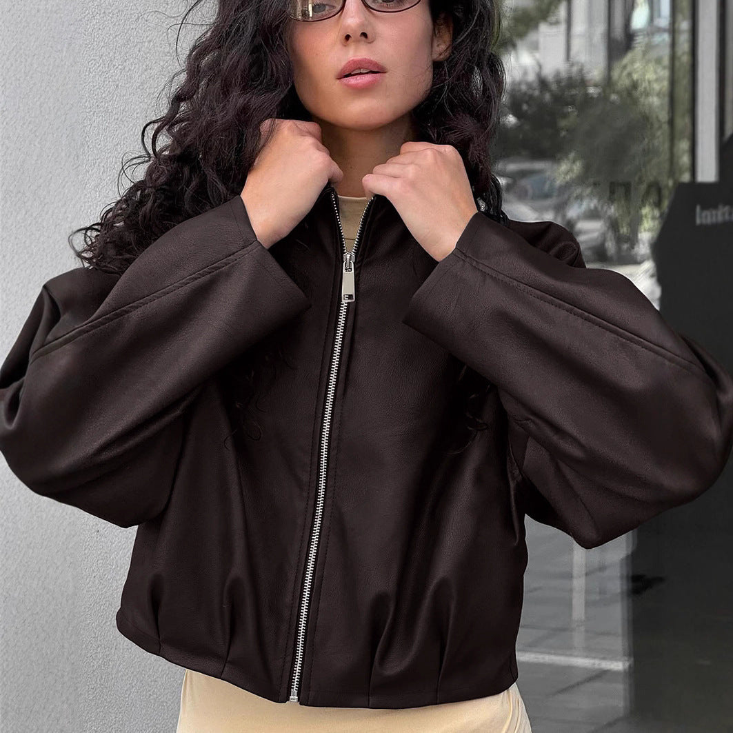 Damer modemedveten cropped läderjacka med voluminösa ärmar Mirla-Eva Jonsson