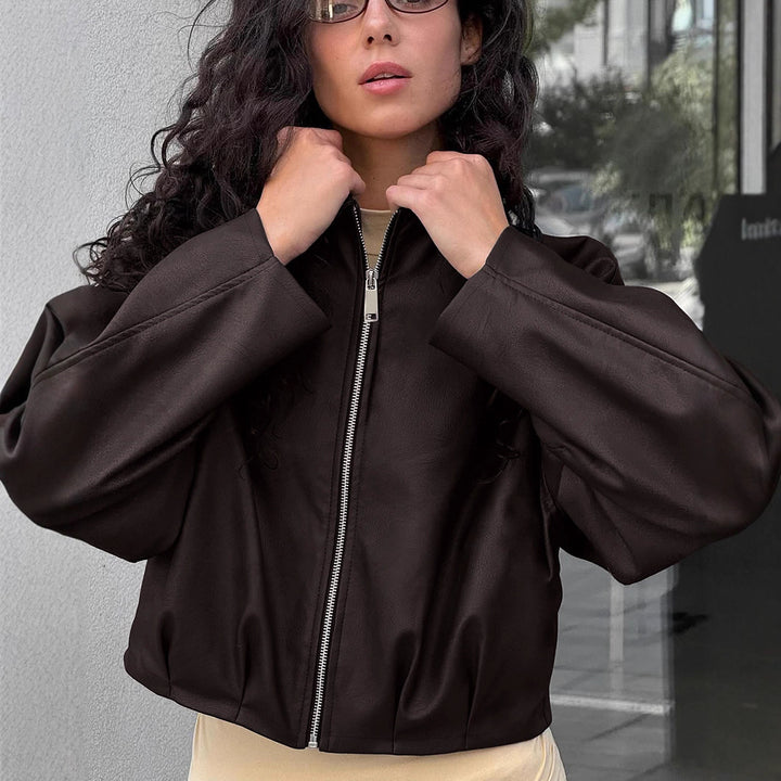 Damer modemedveten cropped läderjacka med voluminösa ärmar Mirla-Eva Jonsson