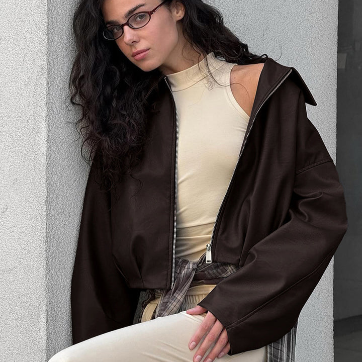 Damer modemedveten cropped läderjacka med voluminösa ärmar Mirla-Eva Jonsson