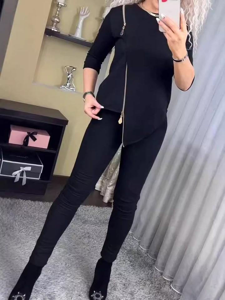 Damer modemedvetet sportset med asymmetisk dragkedja Mirla-Eva Jonsson