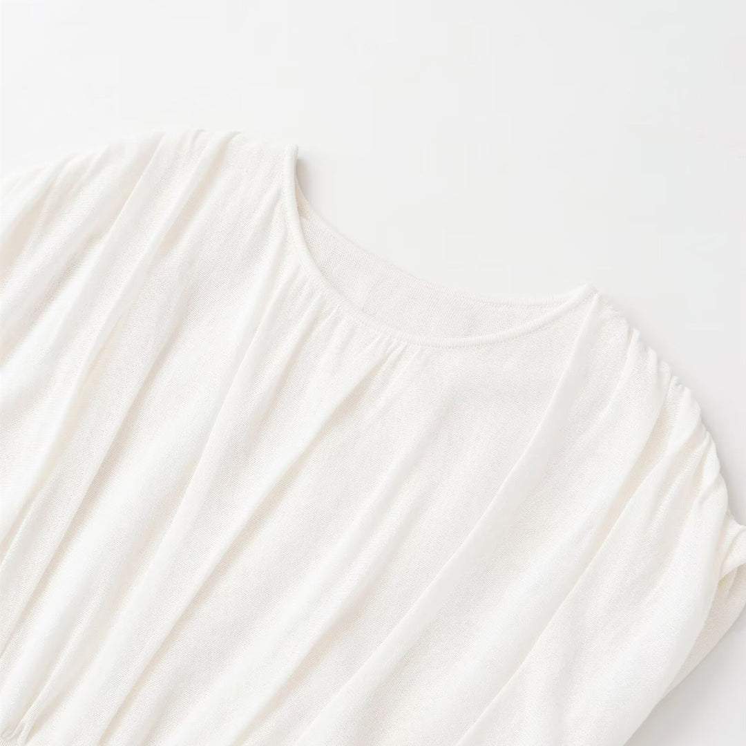 Damer moderikt oversize-top med raffinerad midja Mirla-Eva Jonsson