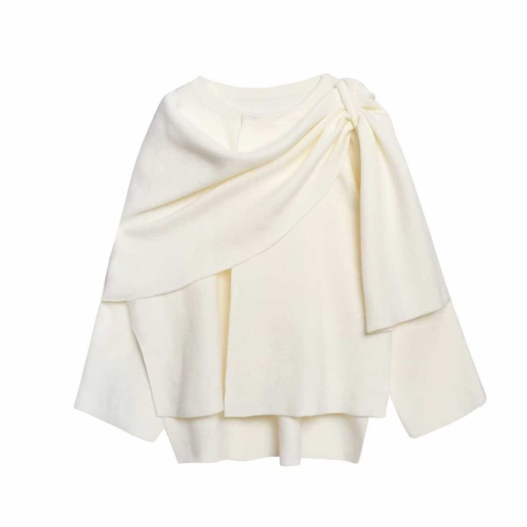 Damer moderiktig poncho med asymmetrisk skärning och elegant drapering Mirla-Eva Jonsson
