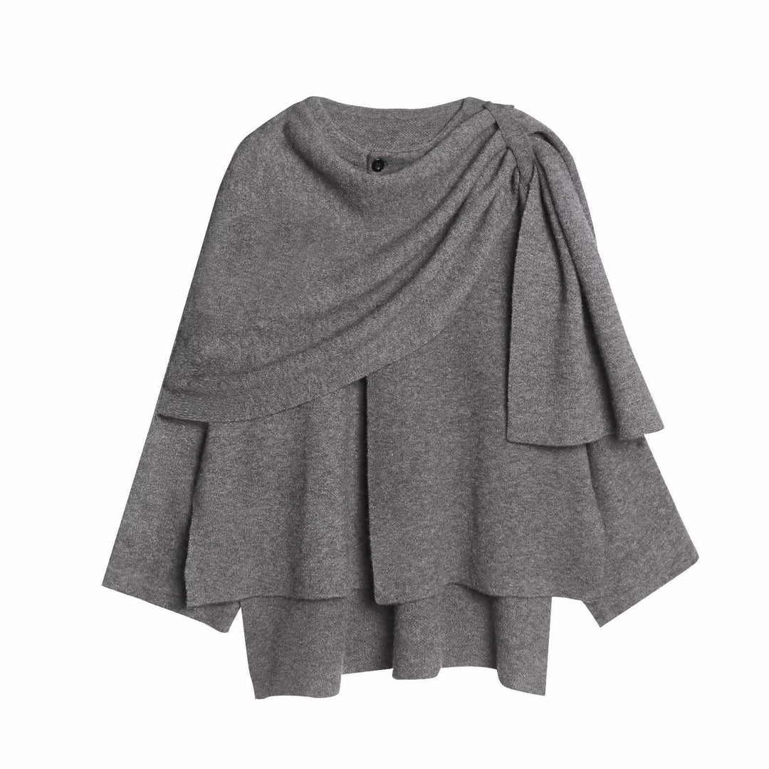 Damer moderiktig poncho med asymmetrisk skärning och elegant drapering Mirla-Eva Jonsson