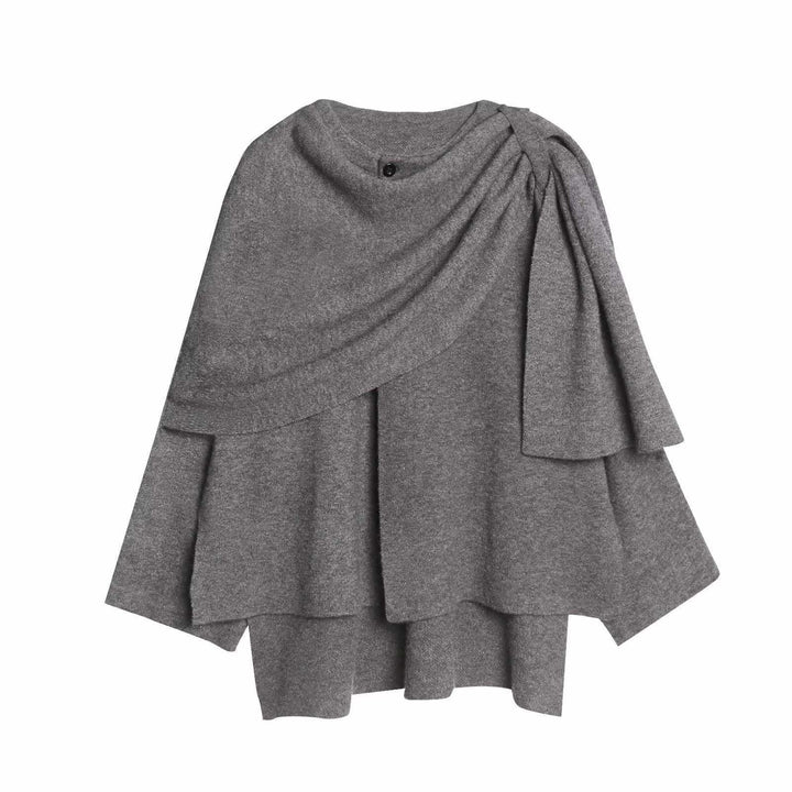 Damer moderiktig poncho med asymmetrisk skärning och elegant drapering Mirla-Eva Jonsson