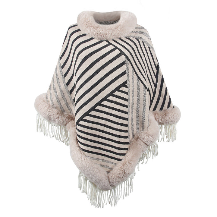 Damer moderiktig poncho med elegant fransdetalj Mirla-Eva Jonsson