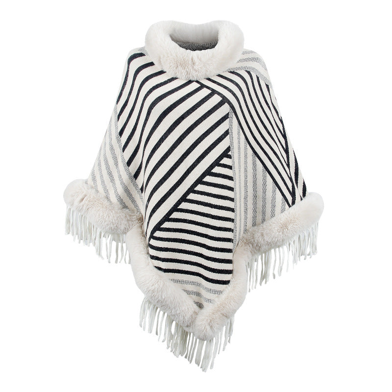 Damer moderiktig poncho med elegant fransdetalj Mirla-Eva Jonsson