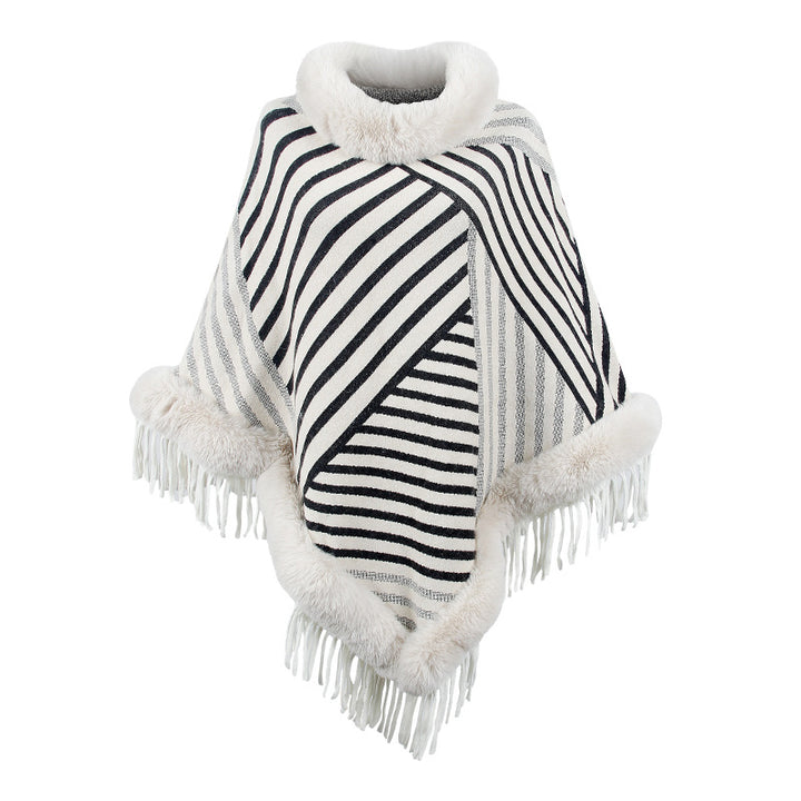 Damer moderiktig poncho med elegant fransdetalj Mirla-Eva Jonsson