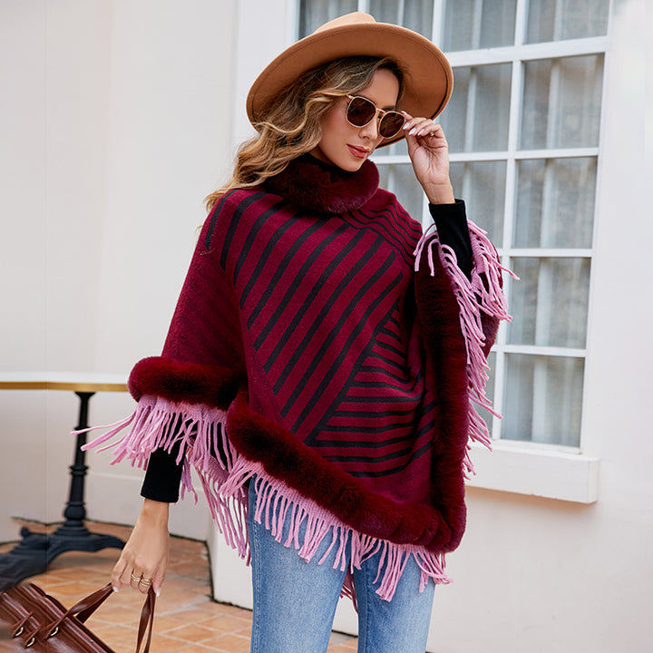 Damer moderiktig poncho med elegant fransdetalj Mirla-Eva Jonsson