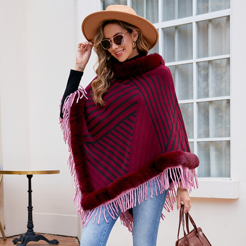 Damer moderiktig poncho med elegant fransdetalj Mirla-Eva Jonsson