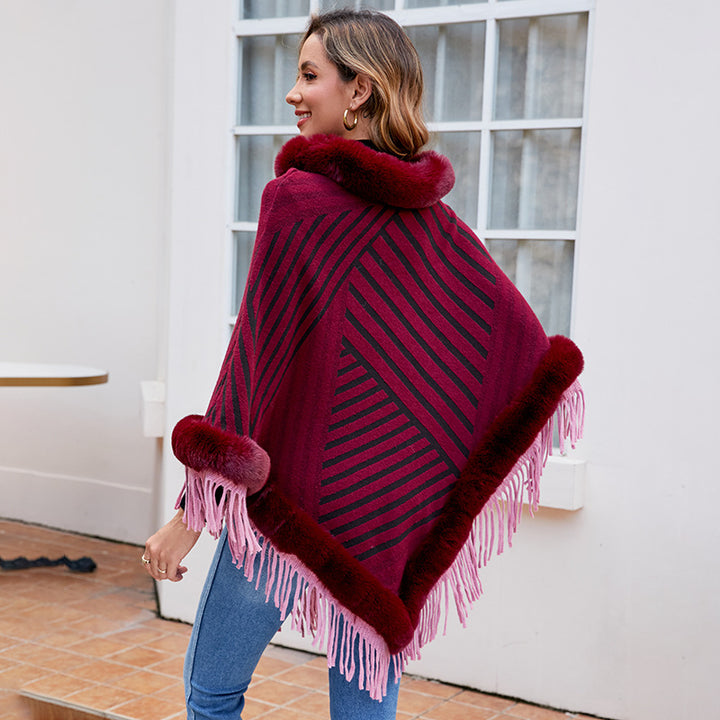Damer moderiktig poncho med elegant fransdetalj Mirla-Eva Jonsson