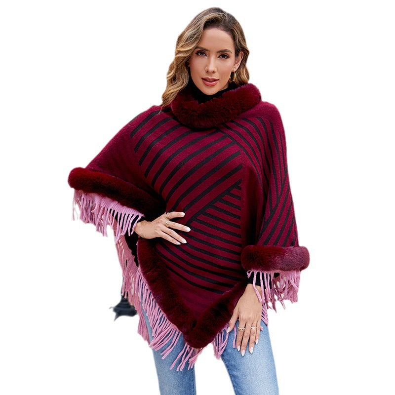 Damer moderiktig poncho med elegant fransdetalj Mirla-Eva Jonsson