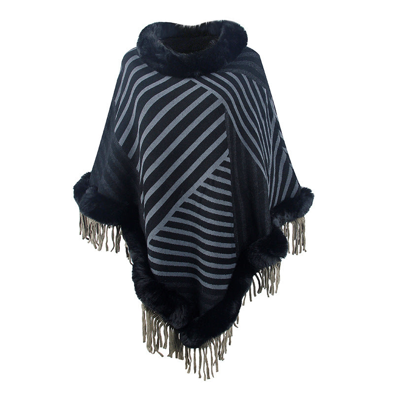 Damer moderiktig poncho med elegant fransdetalj Mirla-Eva Jonsson