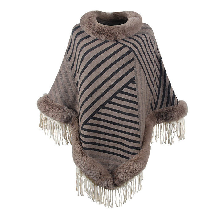 Damer moderiktig poncho med elegant fransdetalj Mirla-Eva Jonsson