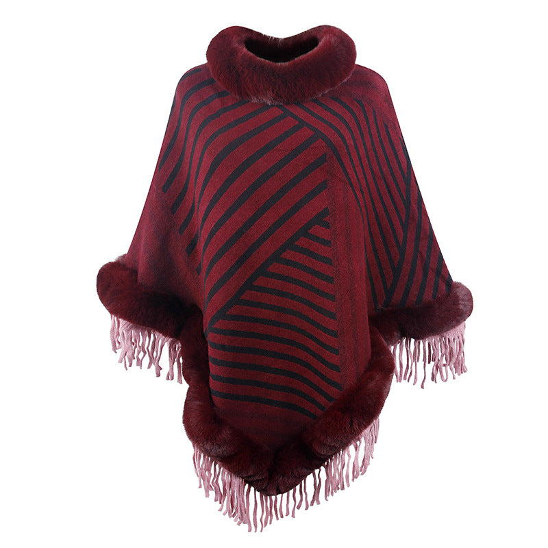 Damer moderiktig poncho med elegant fransdetalj Mirla-Eva Jonsson