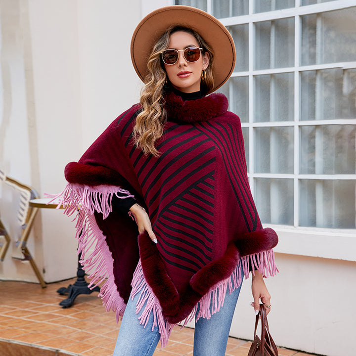 Damer moderiktig poncho med elegant fransdetalj Mirla-Eva Jonsson