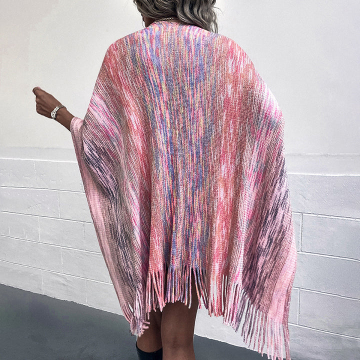 Damer moderiktig poncho med lyxig konstpälsdetalj och kreativa fransar Mirla-Eva Jonsson