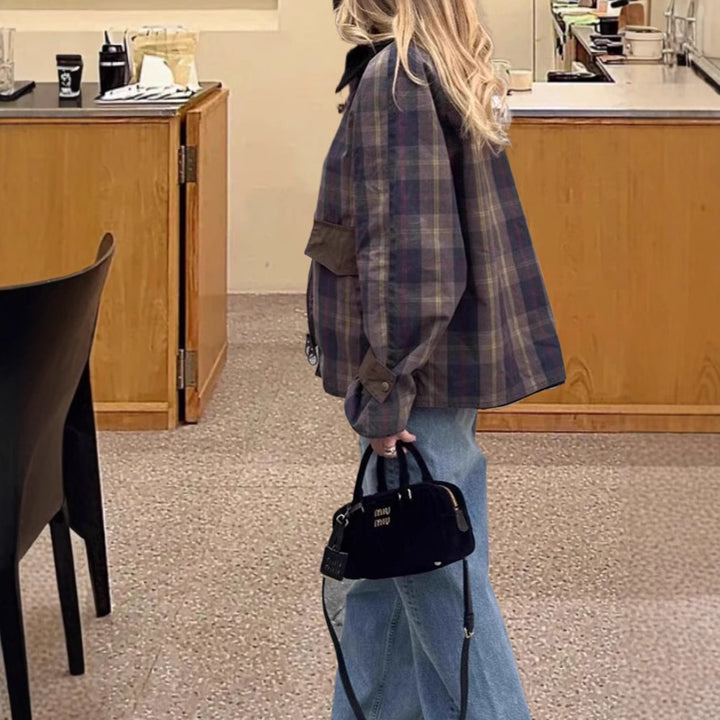 Damer moderiktig rutjacka med avslappnad passform och praktiska fickor Mirla-Eva Jonsson