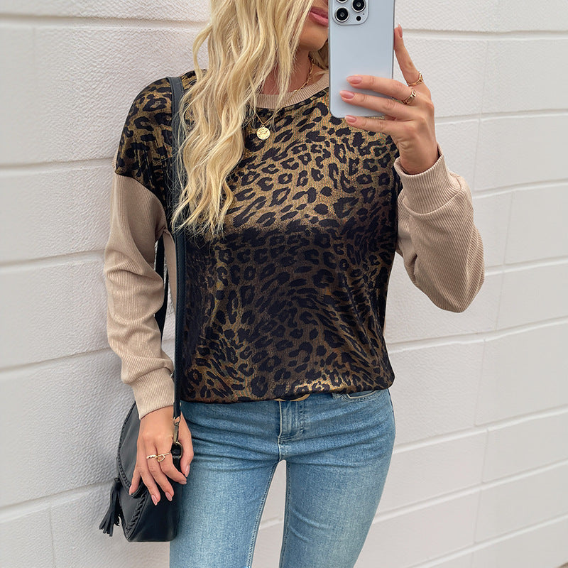 Damer moderiktig sweatshirt med djurleopardmönster och kontrasterande ärmar Mirla-Eva Jonsson