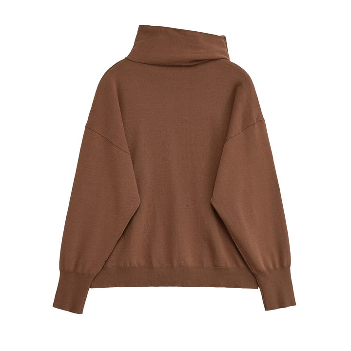 Damer moderiktigt rullkragepullover med eleganta sladdetailjer Mirla-Eva Jonsson