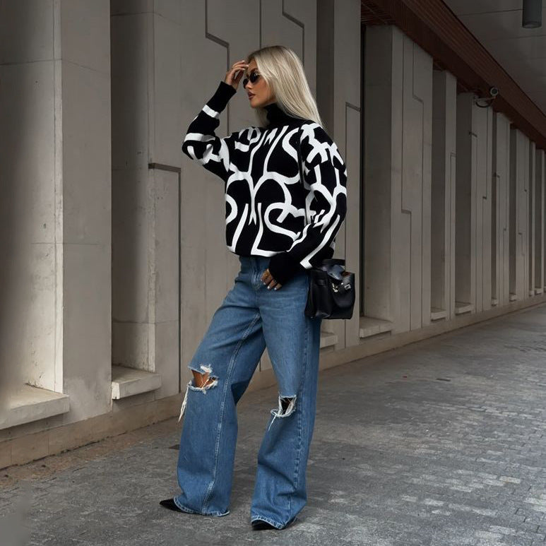 Damer modern oversize stickad tröja med kreativt grafiskt mönster Mirla-Eva Jonsson