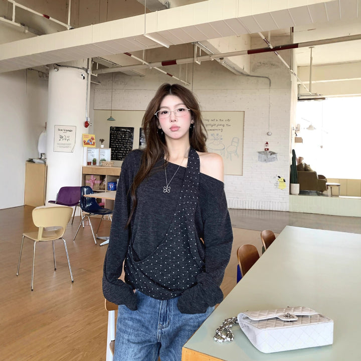 Damer modern topp med asymmetrisk halsringning och elegant rem Mirla-Eva Jonsson