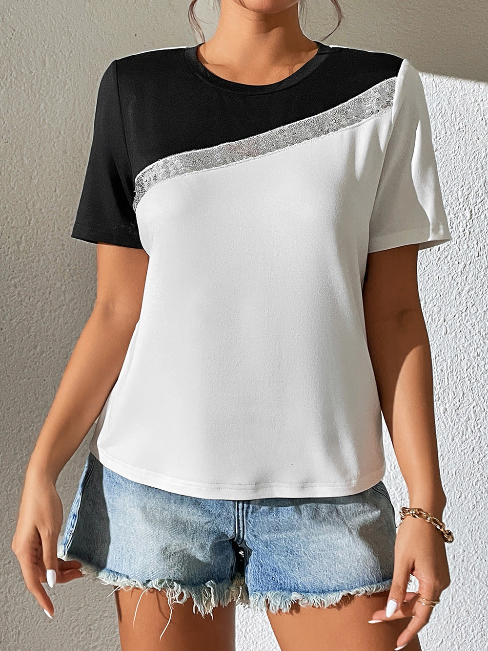 Damer modernt T-shirt med glänsande accenter och avslappnad passform Eva Jonsson-Eva Jonsson
