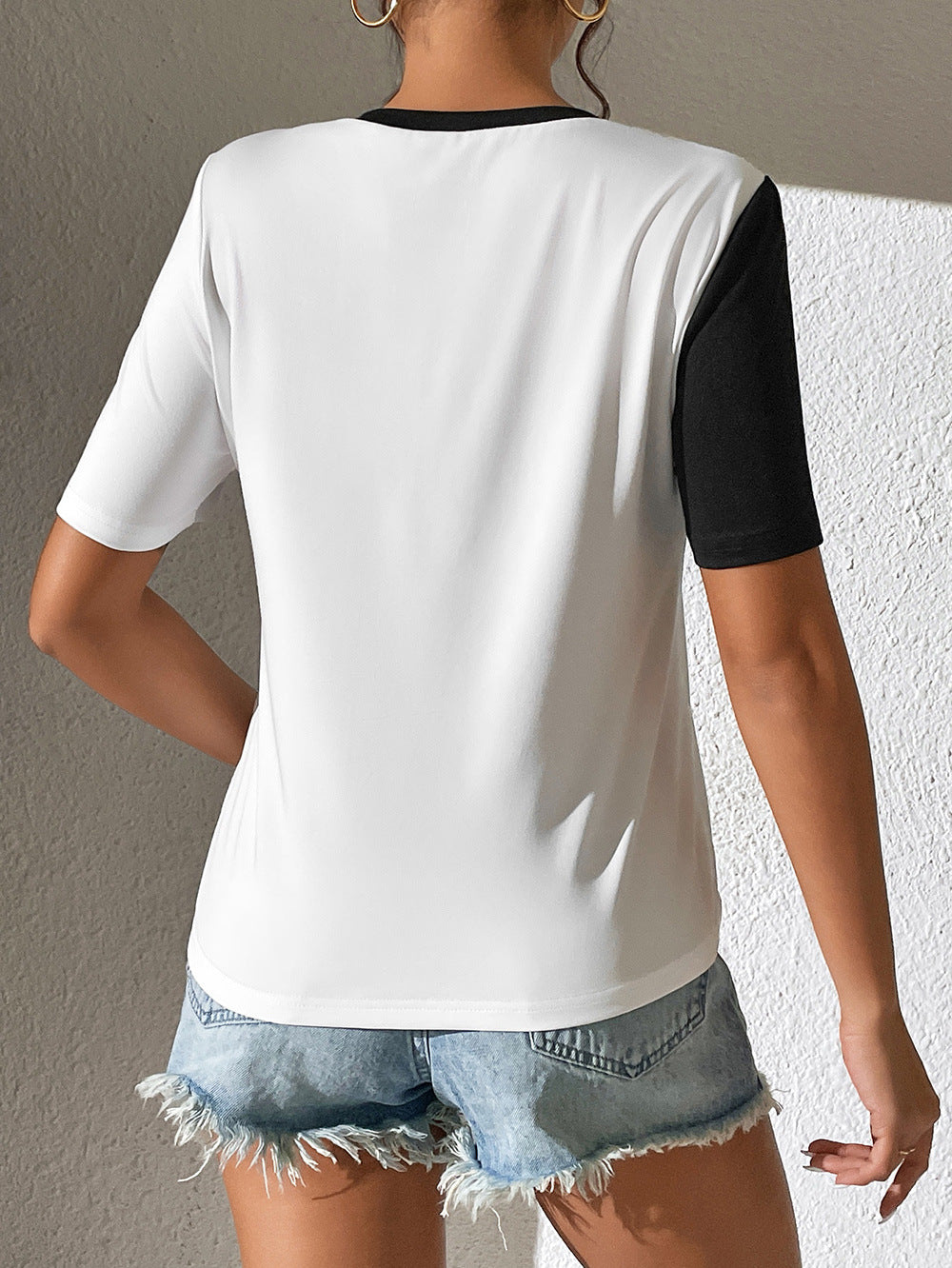 Damer modernt T-shirt med glänsande accenter och avslappnad passform Eva Jonsson-Eva Jonsson