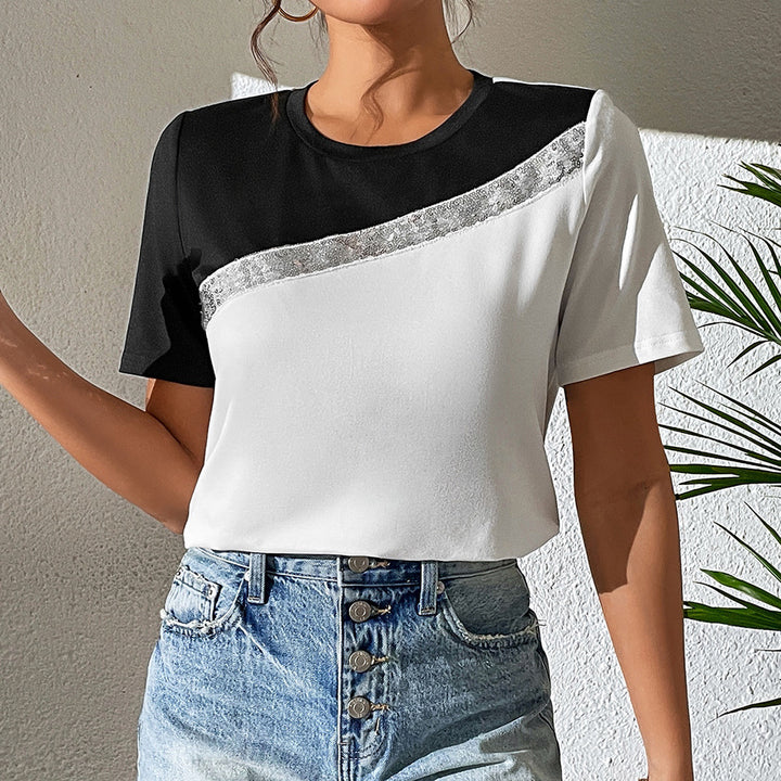 Damer modernt T-shirt med glänsande accenter och avslappnad passform Eva Jonsson-Eva Jonsson