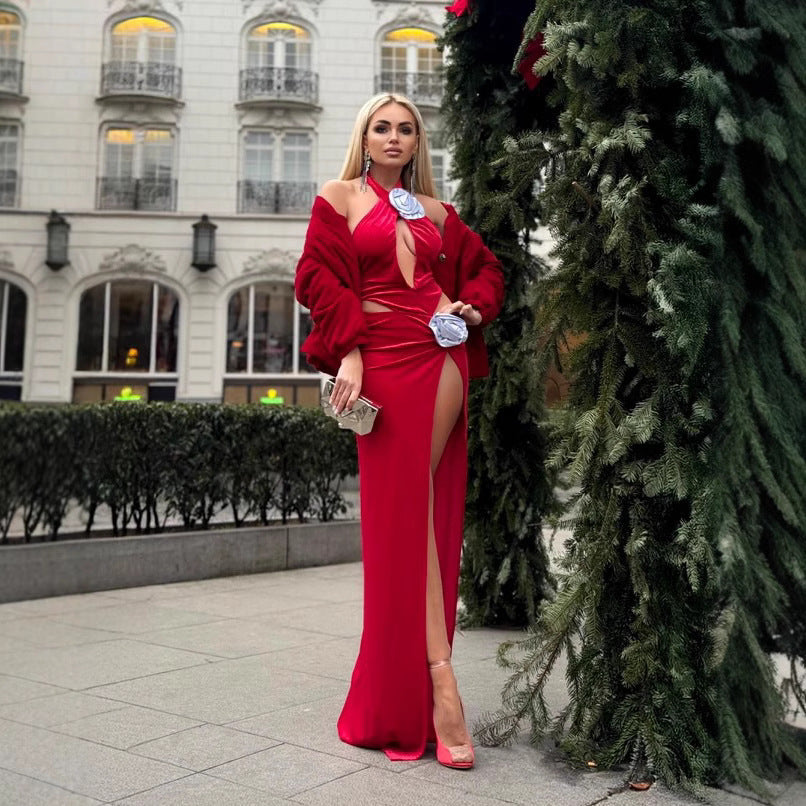 Damer modernt aftonklänning med distinkt cut-out-design och dekorativ blommadetalj Mirla-Eva Jonsson