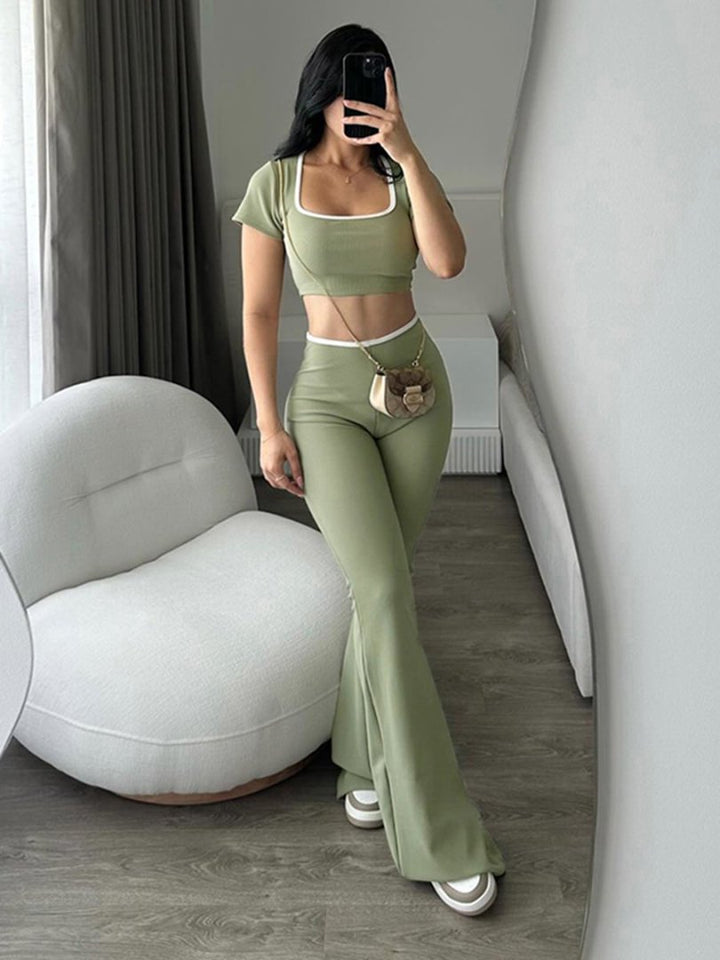 Damer modernt crop-top med figurnära skärning och vid byxa Mirla-Eva Jonsson
