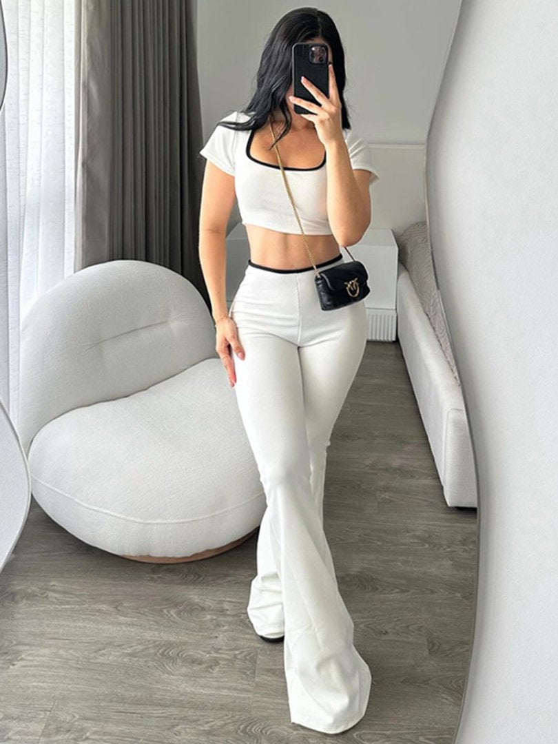 Damer modernt crop-top med figurnära skärning och vid byxa Mirla-Eva Jonsson
