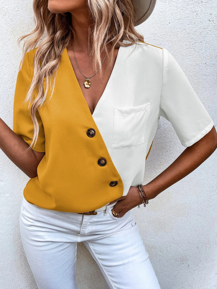 Damer modernt kortärmad blus T-shirt med asymmetrisk design och dekorativa knappar Mirla-Eva Jonsson