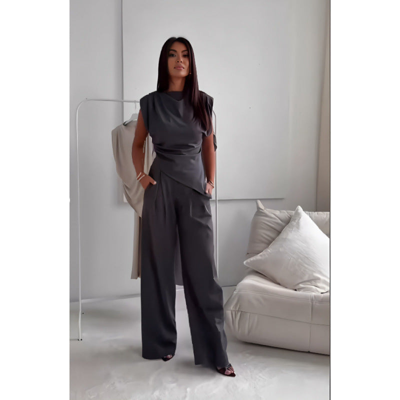 Damer modernt tvådelat set med asymmetrisk topp och vida byxor Mirla-Eva Jonsson