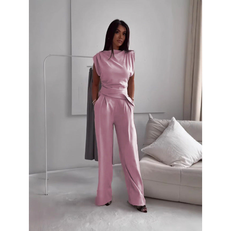 Damer modernt tvådelat set med asymmetrisk topp och vida byxor Mirla-Eva Jonsson